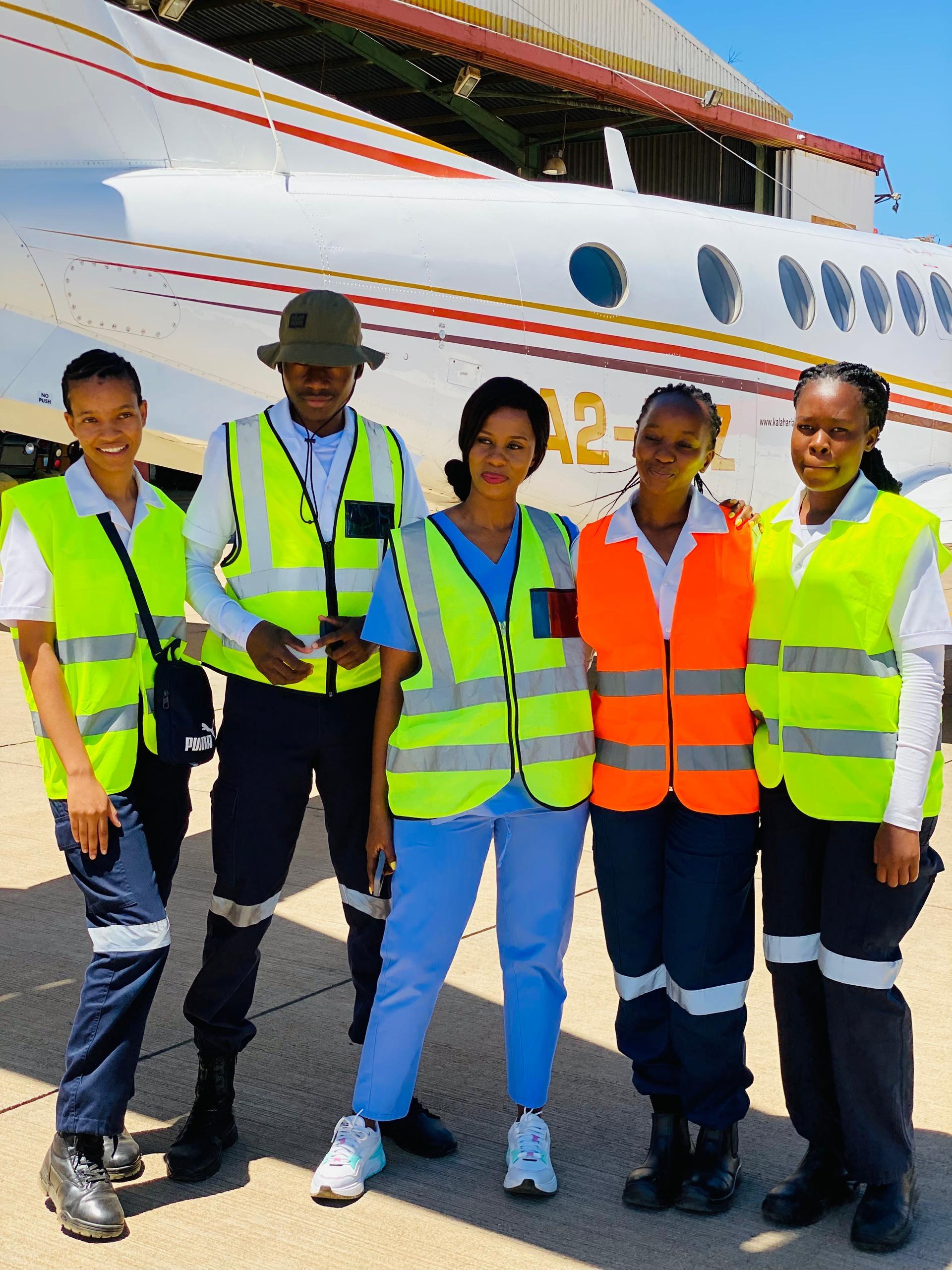 Dr. Phuthego with Boitekanelo students